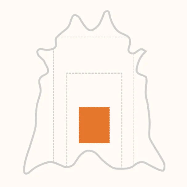 Outline of a cowhide rug with an orange square in the center on a white background