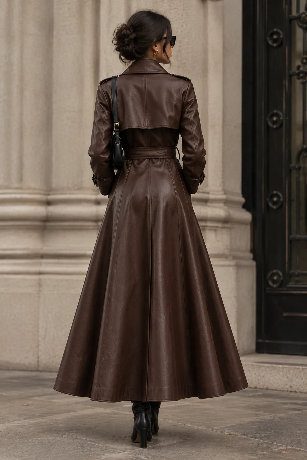 Women's chocolate brown double-breasted leather trench coat, back view