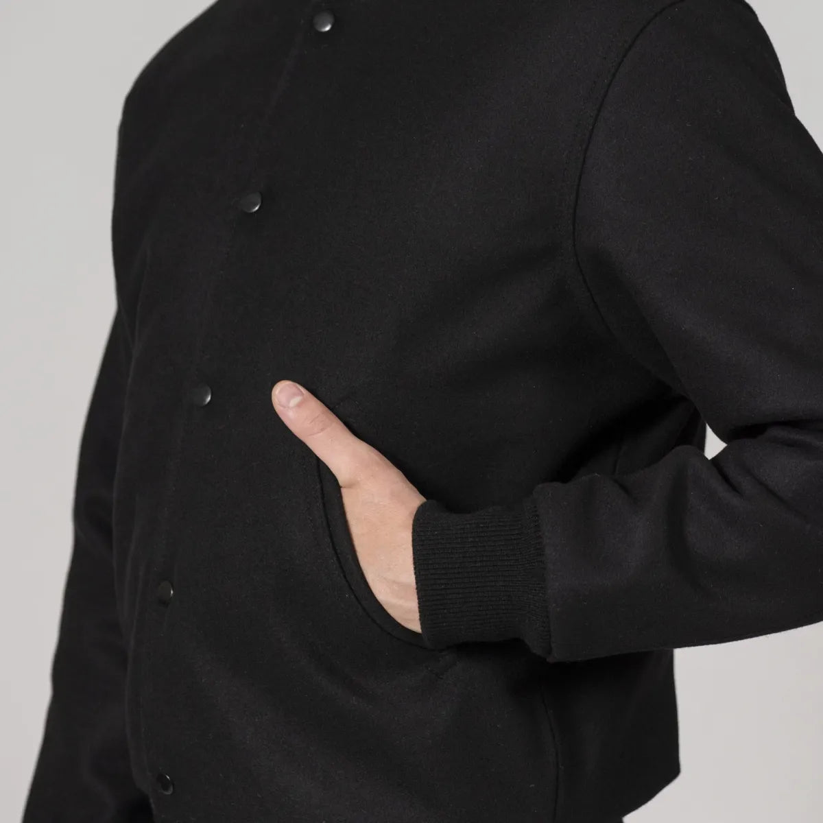 all-black-wool-varsity-jacket-pocket-zoom-by-SKS-Wholesales