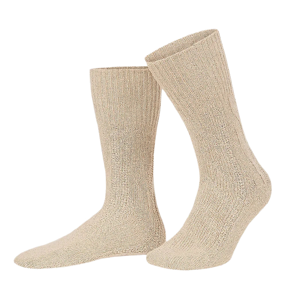 Pair of beige socks on a white background