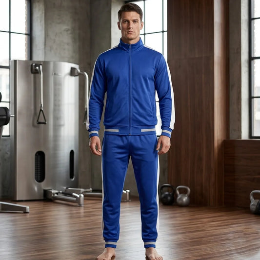 Man wearing a blue tracksuit in a gym setting