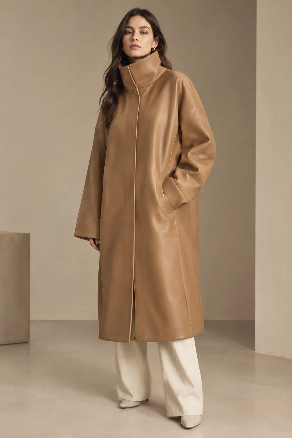 Women's camel oversized minimalist leather coat, funnel neck, back view