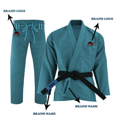 A teal BJJ GI with custom embroidery patches, including a logo on the chest and a brand name on the pants. The garment features a jacket and pants set with reinforced stitching and belt loops.