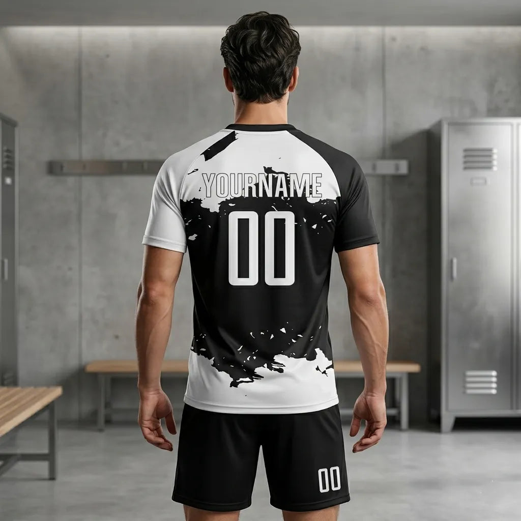 Person wearing a customizable sports jersey with splatter design in a locker room setting.