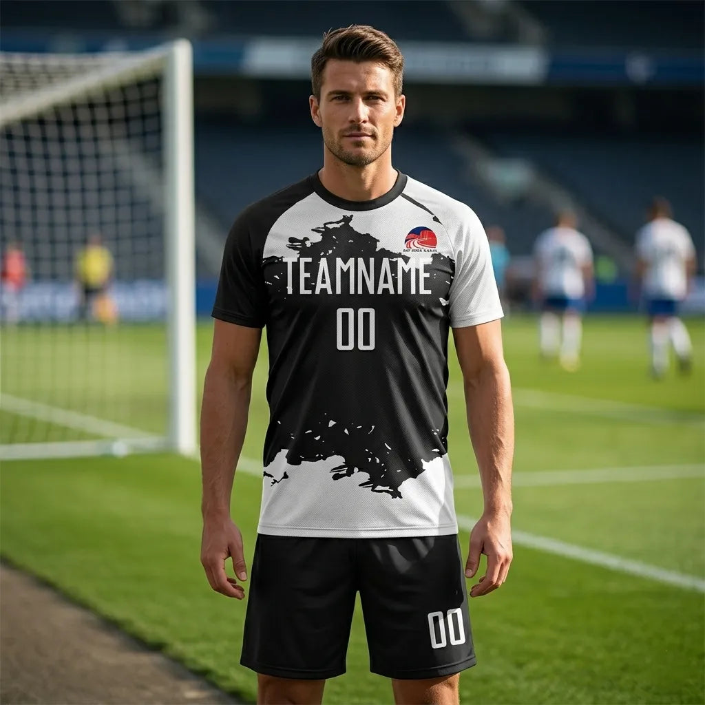 Man wearing a sports jersey with 'TEAMNAME' and number on a soccer field