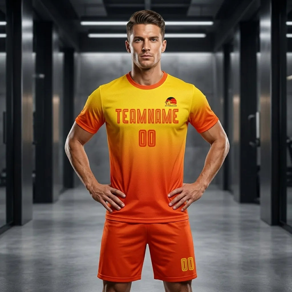 Man wearing a yellow and orange sports outfit with 'TEAMNAME' printed on the shirt in a modern indoor setting.