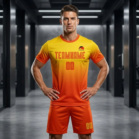 Man wearing a yellow and orange sports outfit with 'TEAMNAME' printed on the shirt in a modern indoor setting.