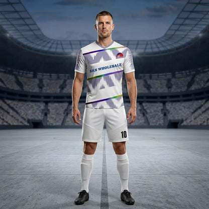 Man wearing a sports uniform with 'SKS Wholesale' branding in a stadium setting